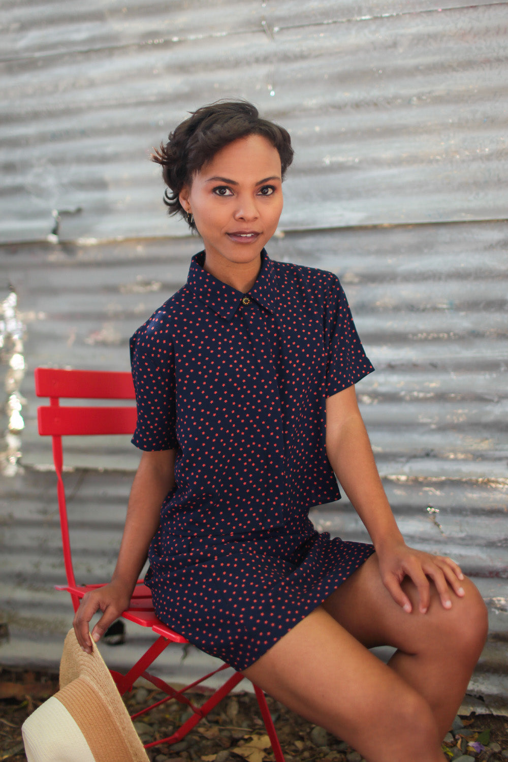 Freedom To Dance Mini Skirt featuring dark blue stars pattern, perfect for warm weather outings.