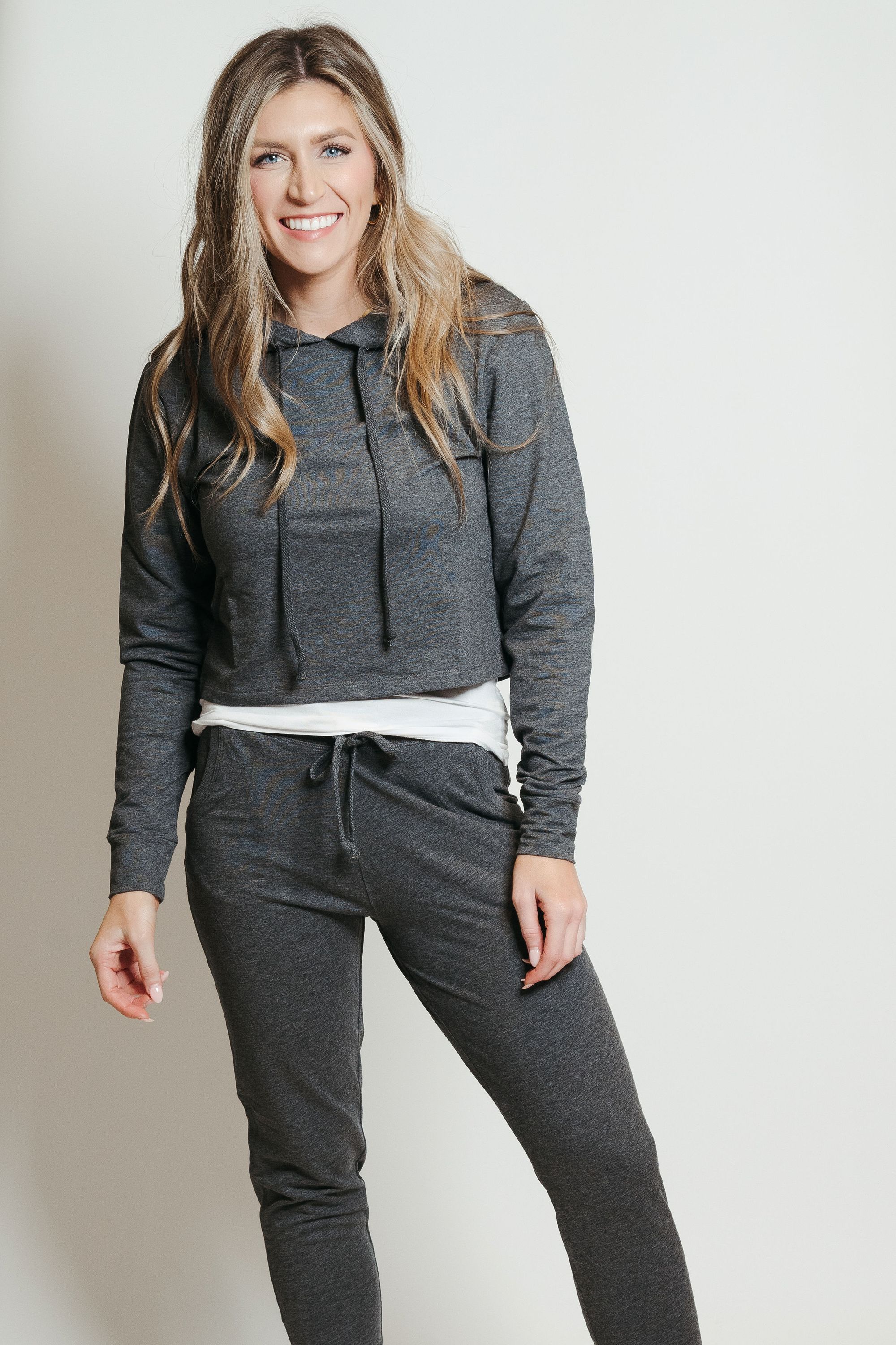 Charcoal French Terry Hoodie-Jogger Lounge Set displayed on a mannequin, showcasing its cropped hoodie and snug joggers.