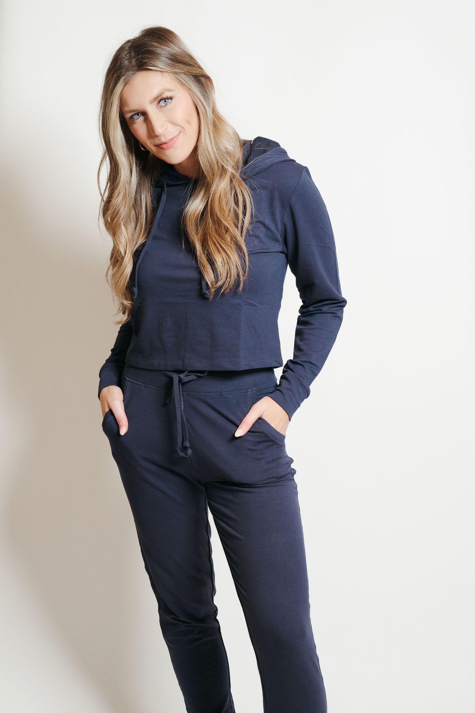 Navy French Terry Hoodie-Jogger Lounge Set displayed on a mannequin, showcasing the cropped hoodie and snug joggers.