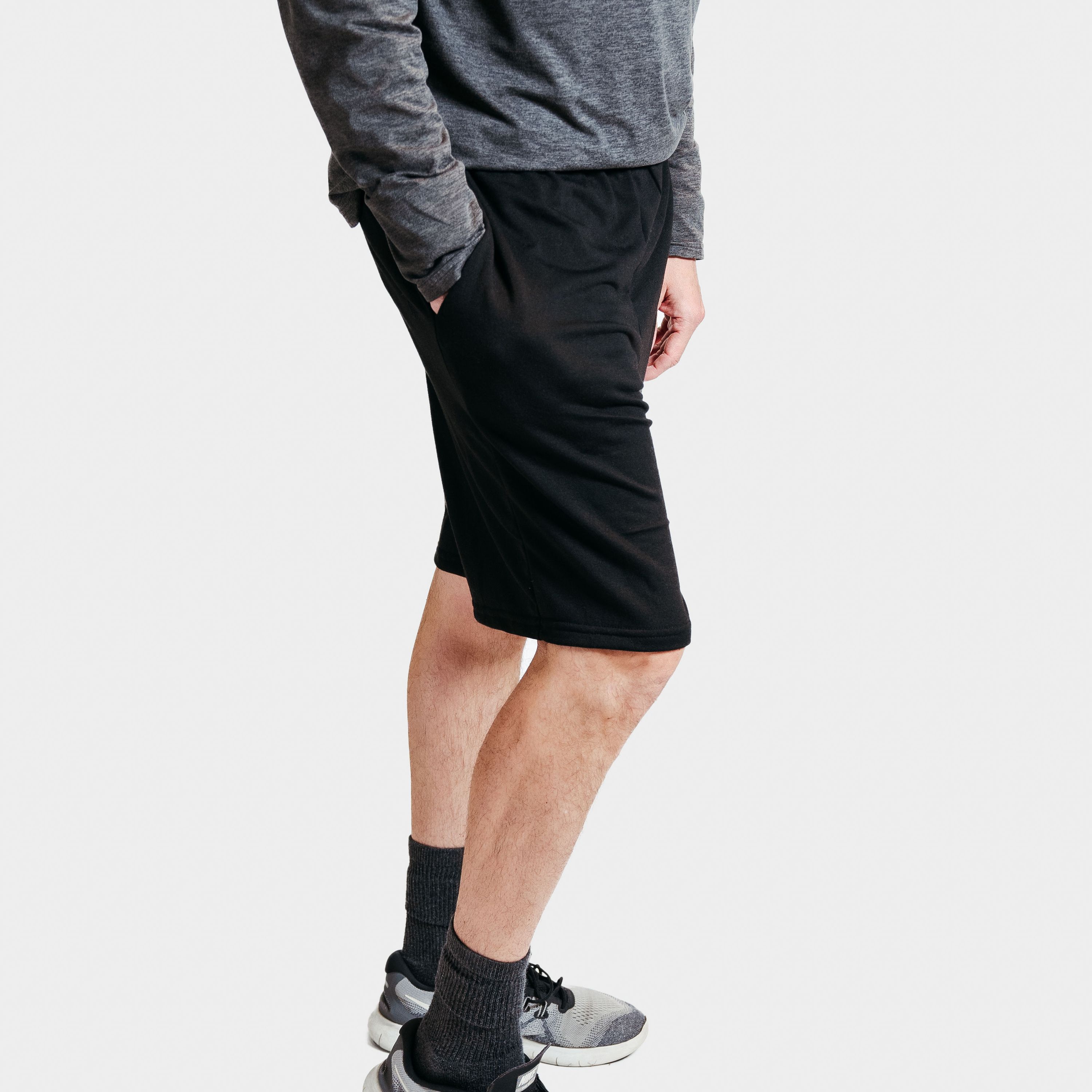 A pair of black French Terry lounge shorts featuring a soft fabric, adjustable waistband, and relaxed fit, perfect for lounging or casual wear.