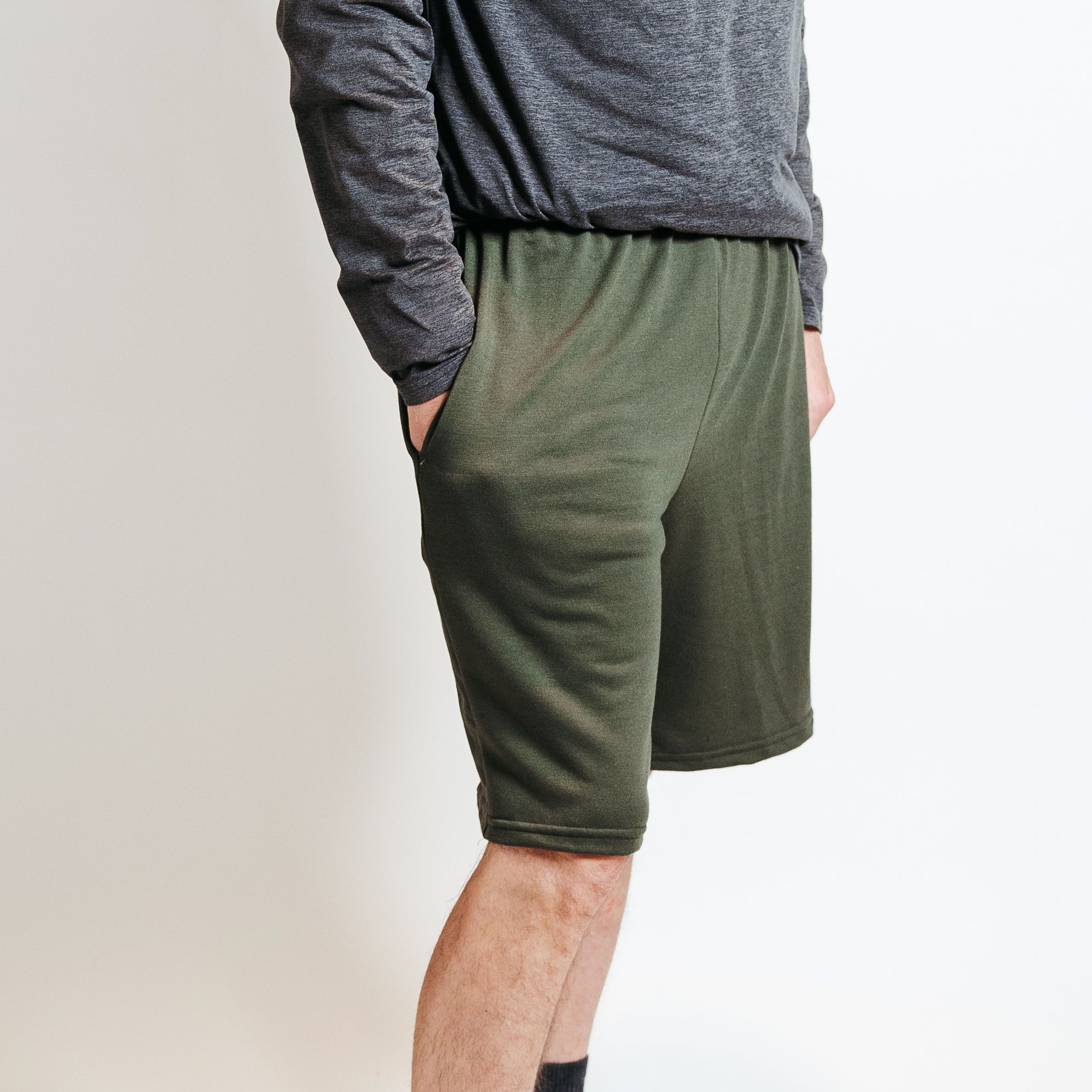 Olive French Terry Lounge Shorts with adjustable waistband and soft fabric, perfect for lounging and casual wear.