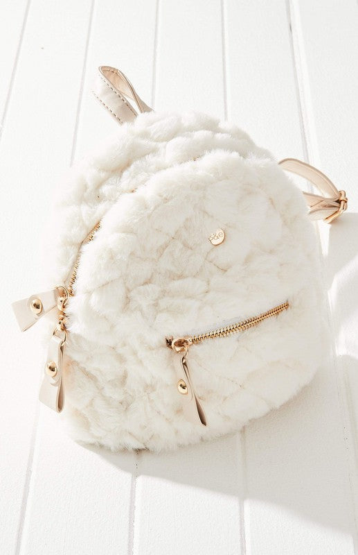 Freycinet Quilted Mini Backpack featuring plush vegan fur and leather trim, showcasing diamond quilting and adjustable straps.