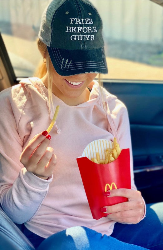 Fries Before Guys Embroidered Trucker Hat featuring a playful slogan on the front, made of cotton and polyester with a mesh back.