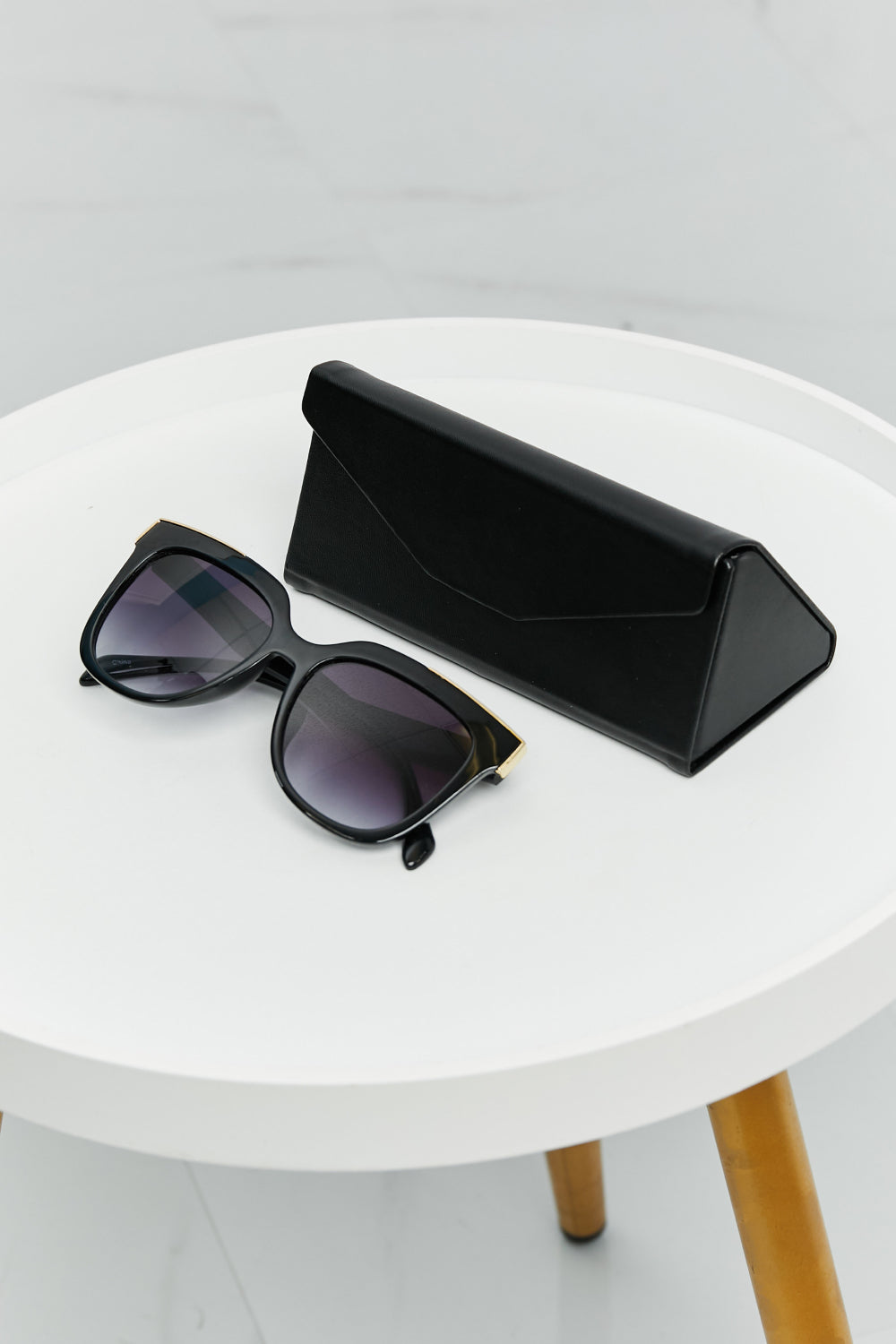 Full Rim Polycarbonate Frame Sunglasses in Wayfare shape, showcasing a stylish design with a protective case.