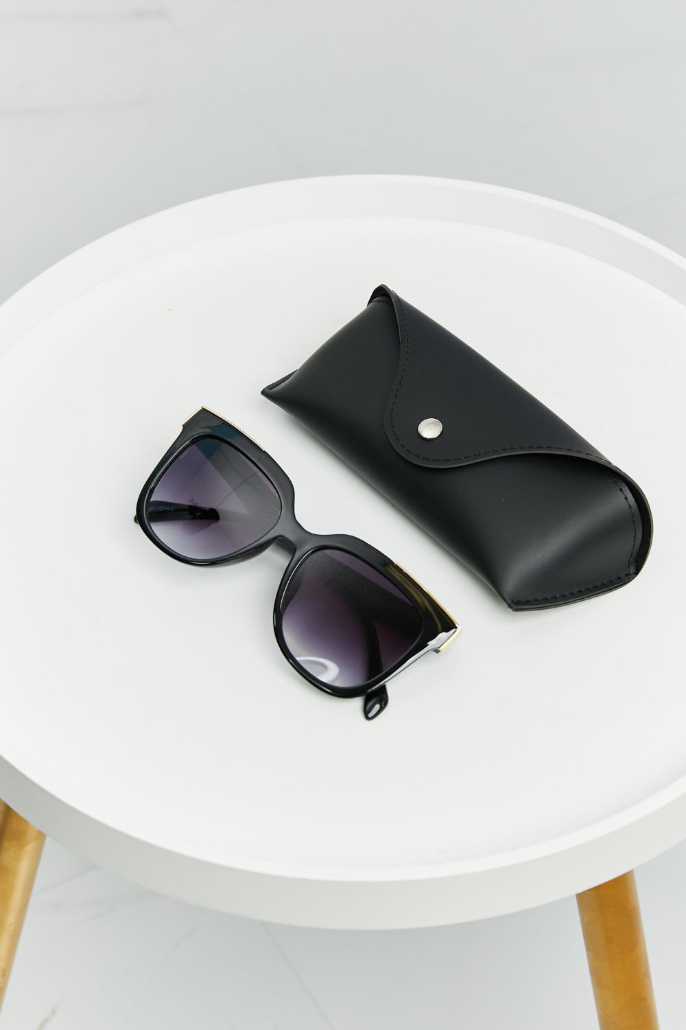 Full Rim Polycarbonate Frame Sunglasses in Wayfare shape, showcasing a stylish design with a protective case.