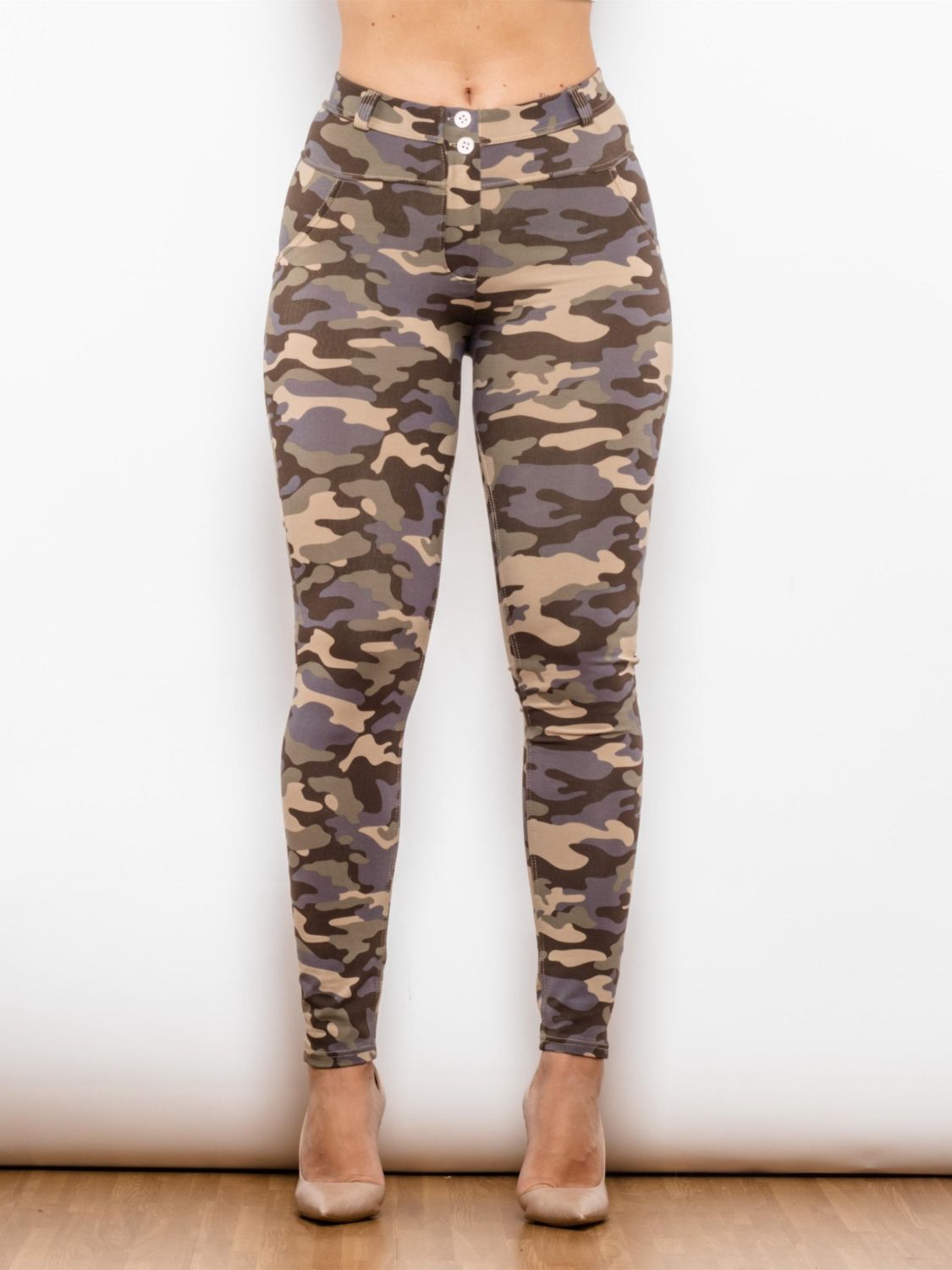 Full Size Camouflage Buttoned Leggings showcasing a stylish camouflage pattern with button details, designed for a slim fit and comfort.