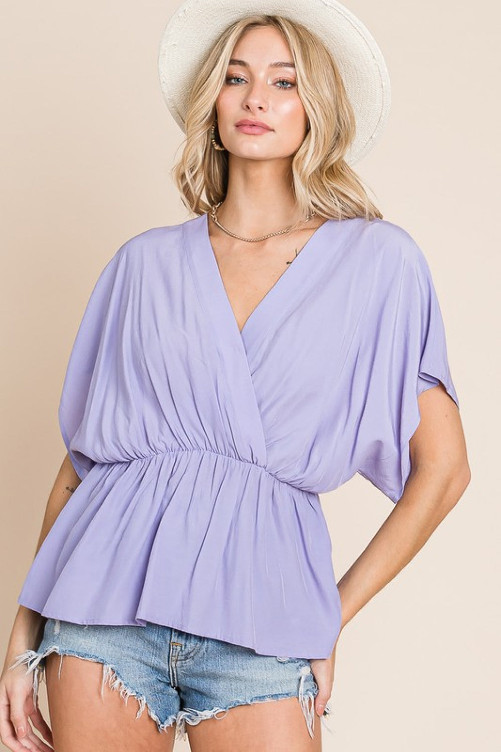 Gaining Confidence Full Size Kimono Sleeve Top featuring a peplum hem and dramatic kimono sleeves in a solid color.