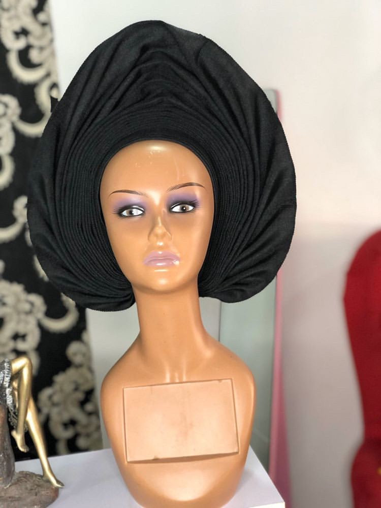 A stylish Gele Hat made from premium asooke fabric, showcasing vibrant colors and elegant design, perfect for various occasions.