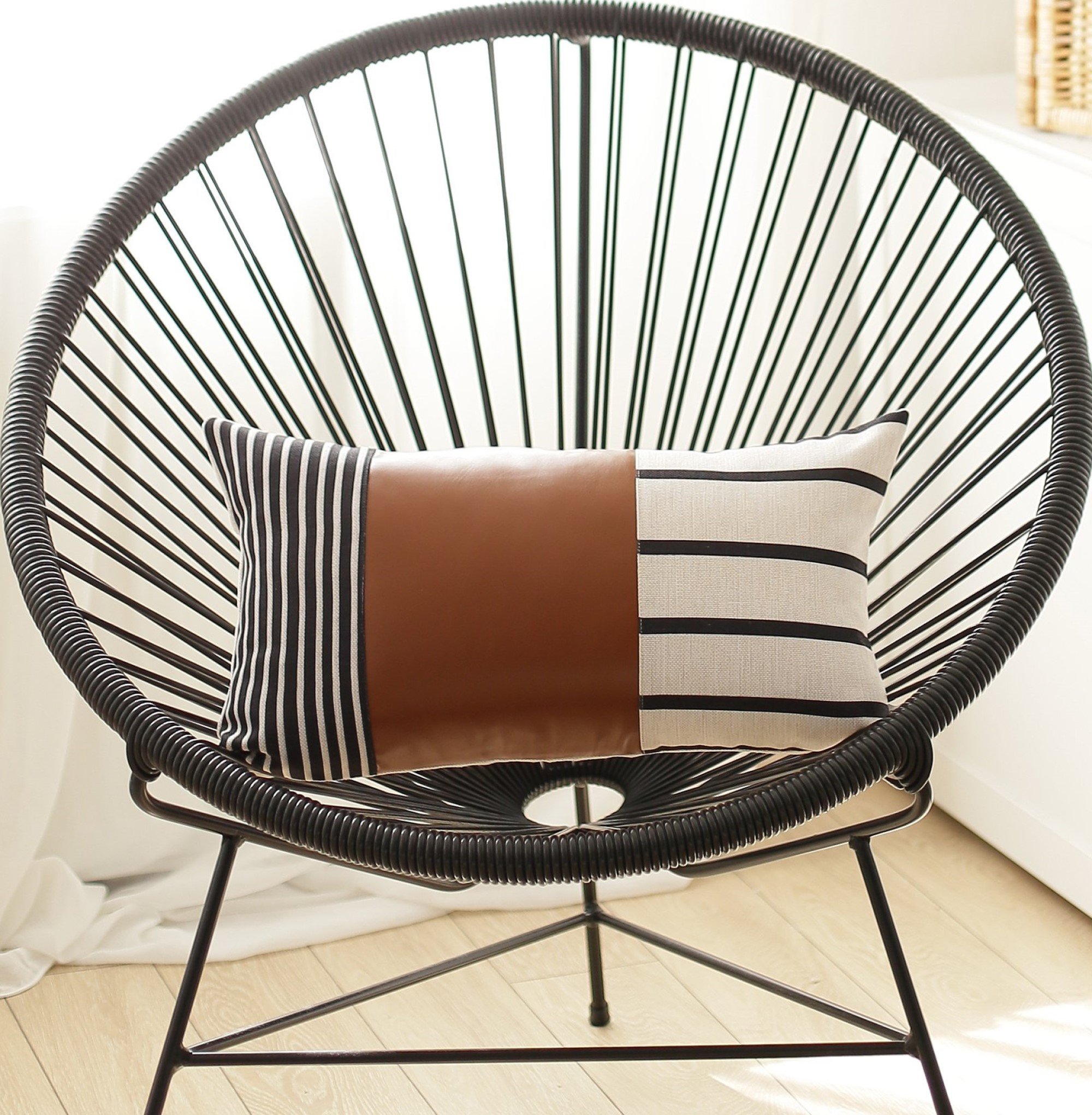 Geometric Brown Faux Leather and Stripes Lumbar Pillow Cover featuring a unique design with printed stripes and soft vegan faux leather.