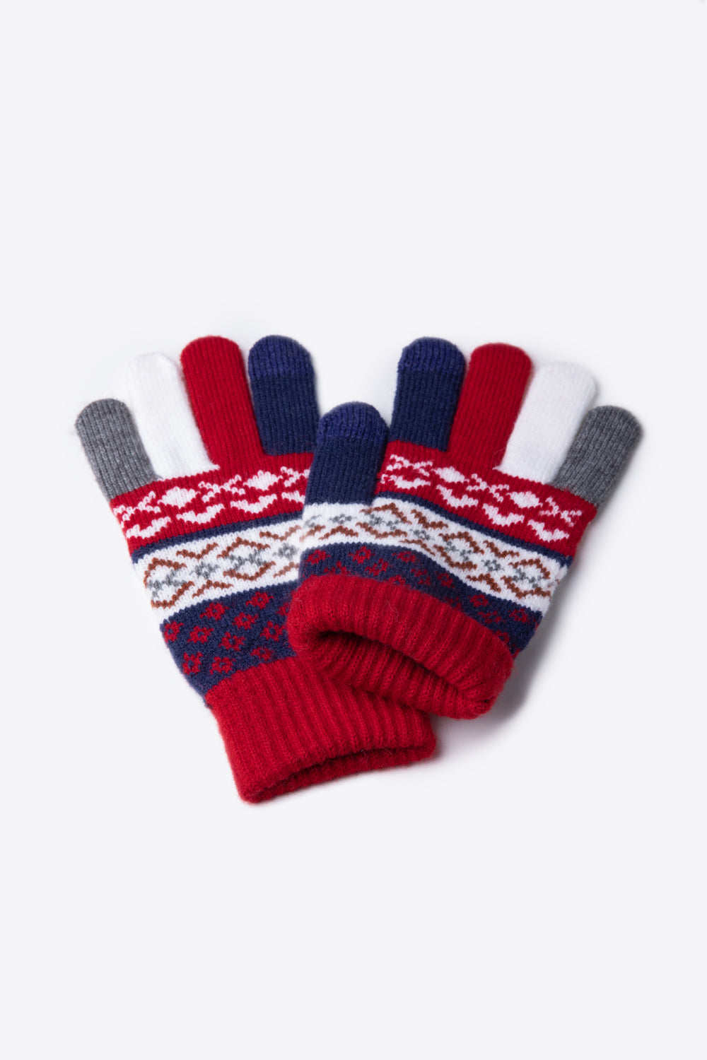 A flat lay of Geometric Five-Finger Knit Gloves showcasing their stylish design and soft acrylic material.