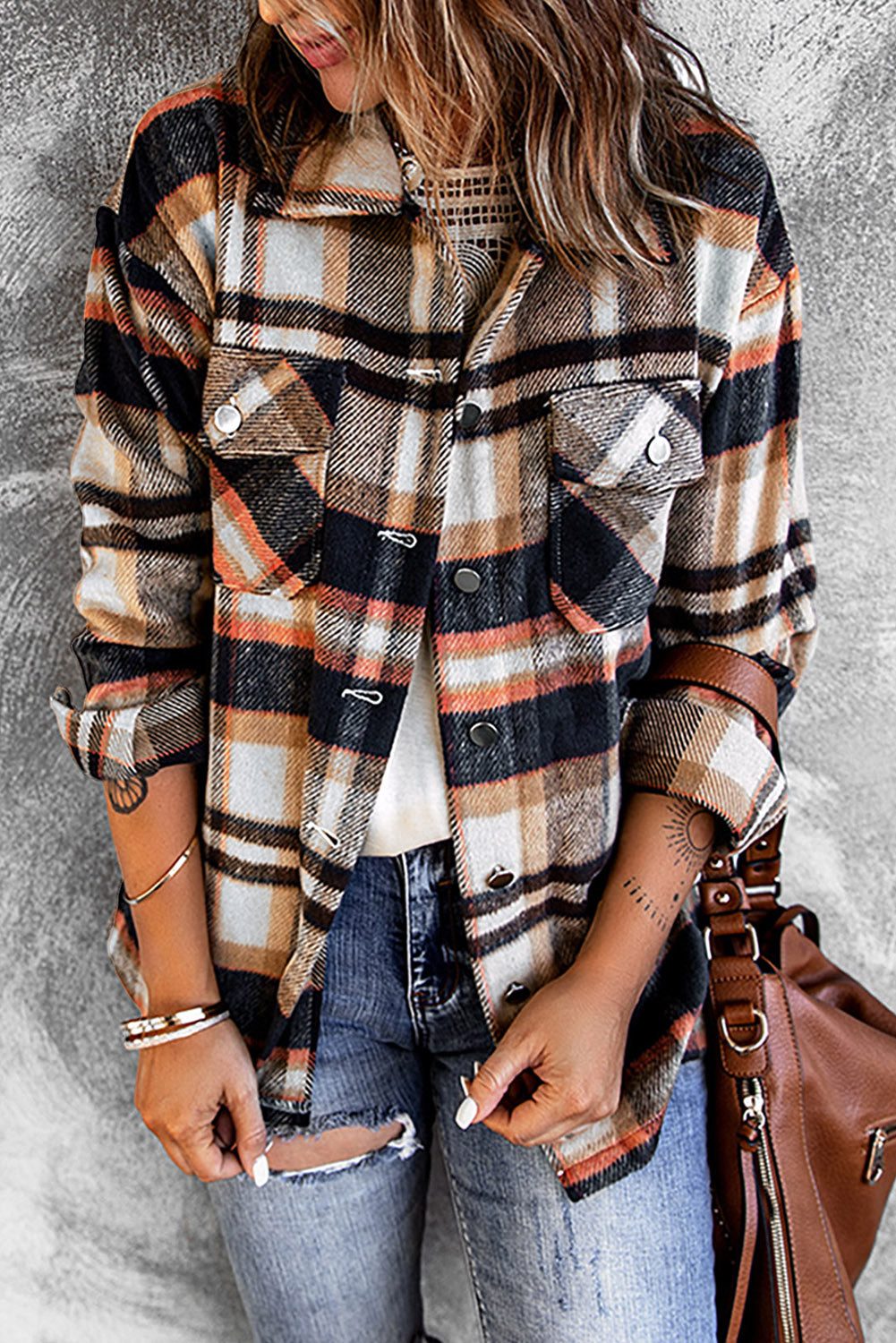 A cozy Geometric Plaid Print Pocketed Shacket featuring a classic plaid pattern, button front, and large pockets, perfect for chilly weather.