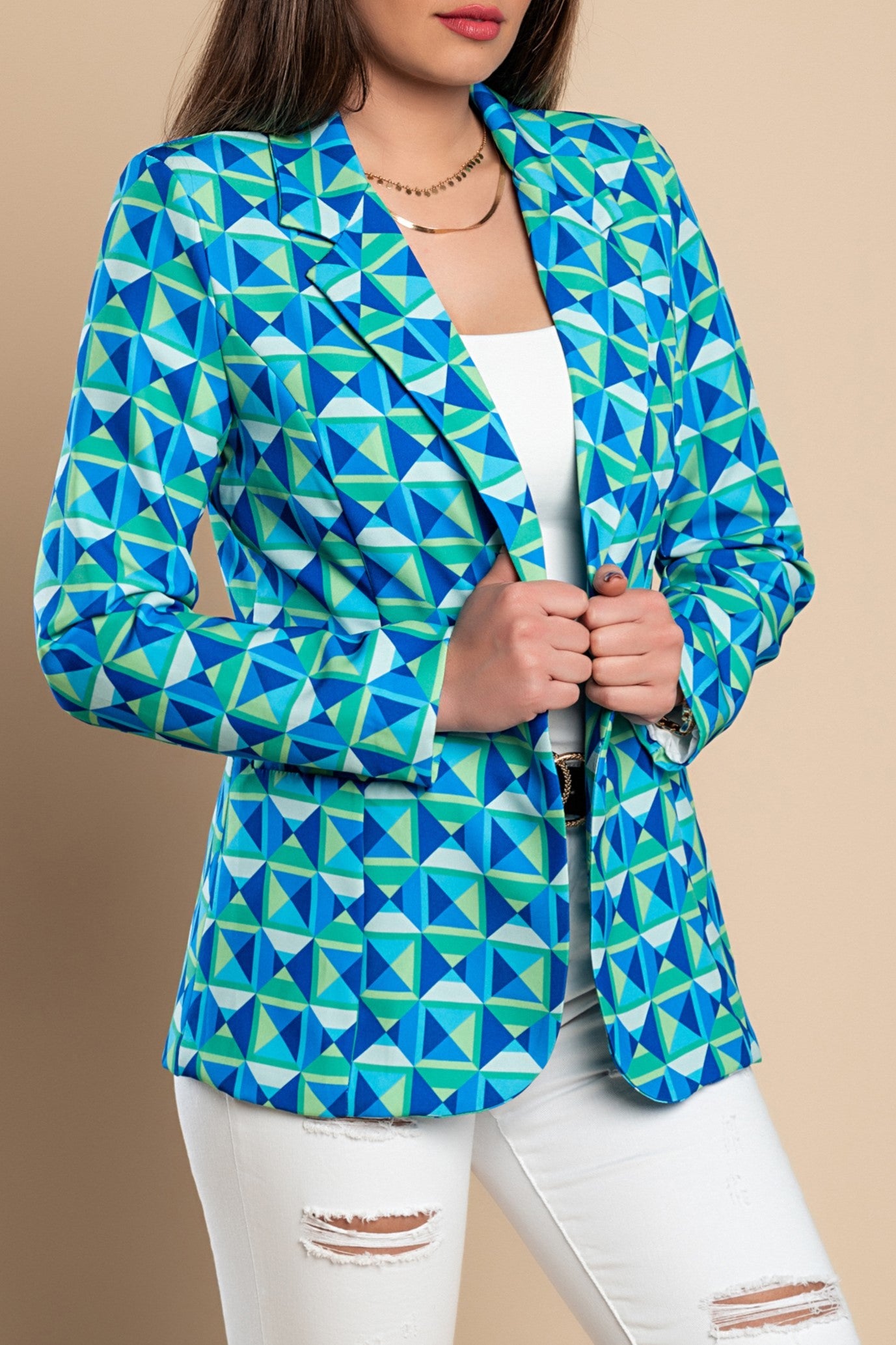 A stylish blue geometric print blazer featuring a classic collar, padded shoulders, and faux pockets, perfect for any occasion.