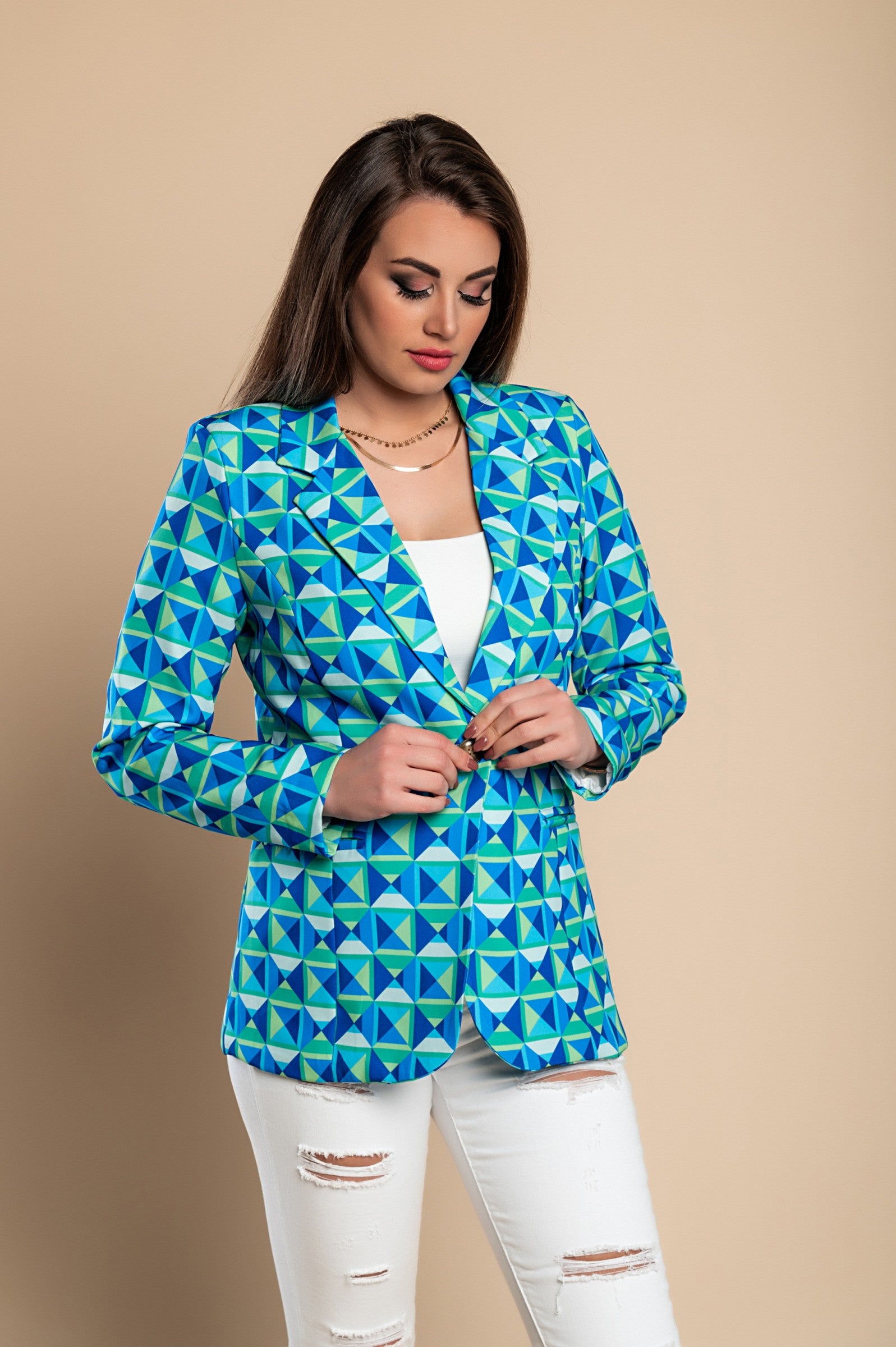 A stylish blue geometric print blazer featuring a classic collar, padded shoulders, and faux pockets, showcasing high-quality Italian craftsmanship.