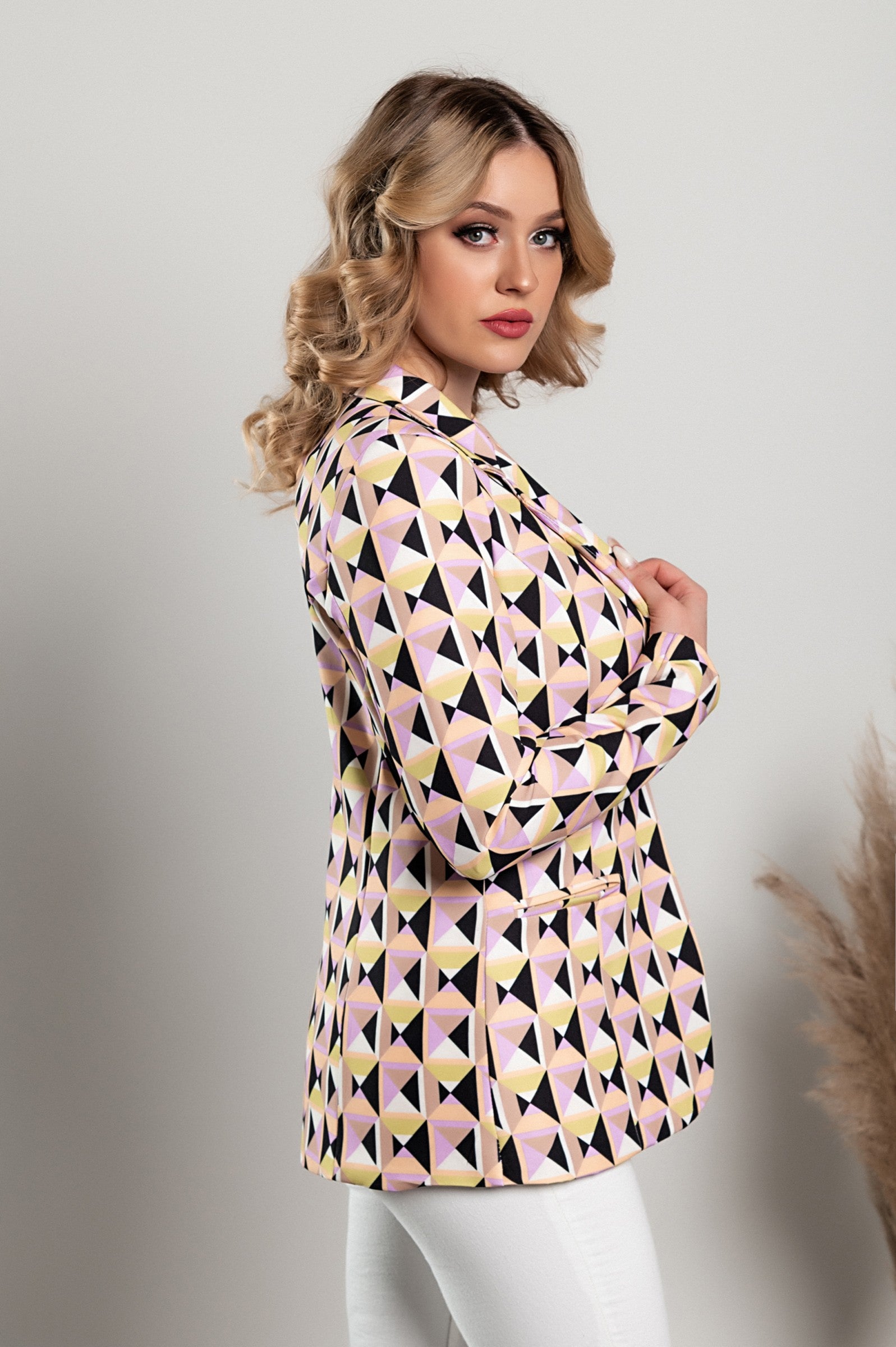 Lilac geometric print blazer featuring a classic collar, padded shoulders, and faux pockets, made from high-quality materials.