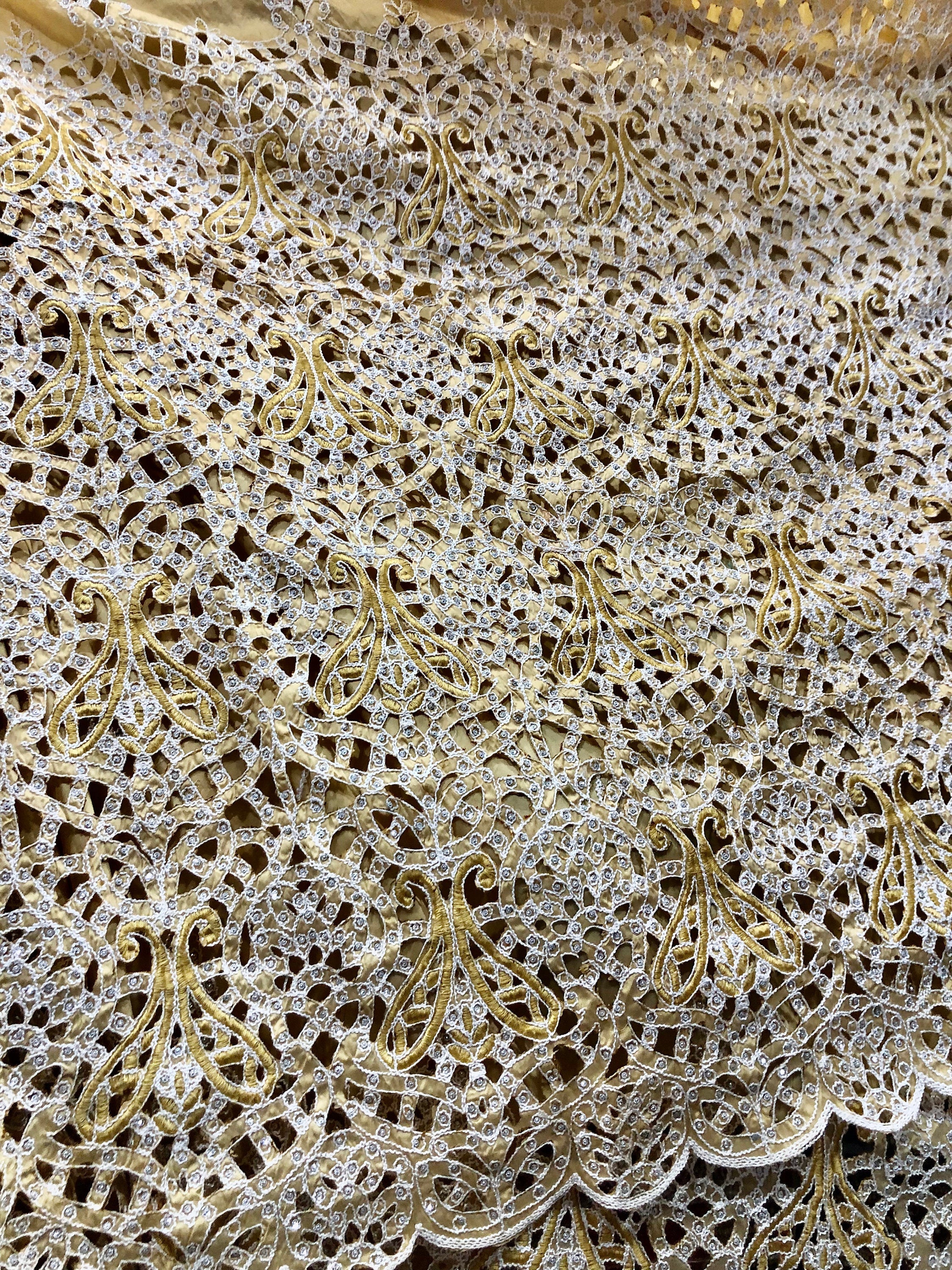 Intricate gold and white lace.