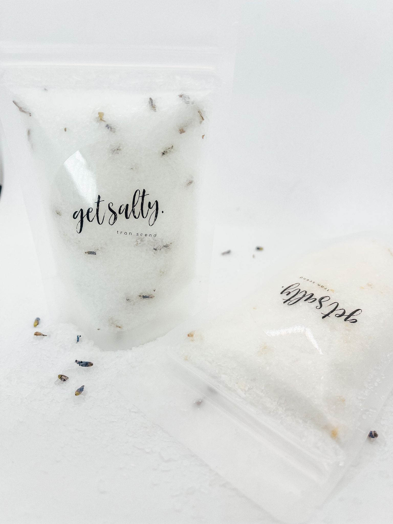 Get Salty Bath Salts in a 4 oz. bag featuring Pink Himalayan and Epsom salts with lavender and citrus essential oils.