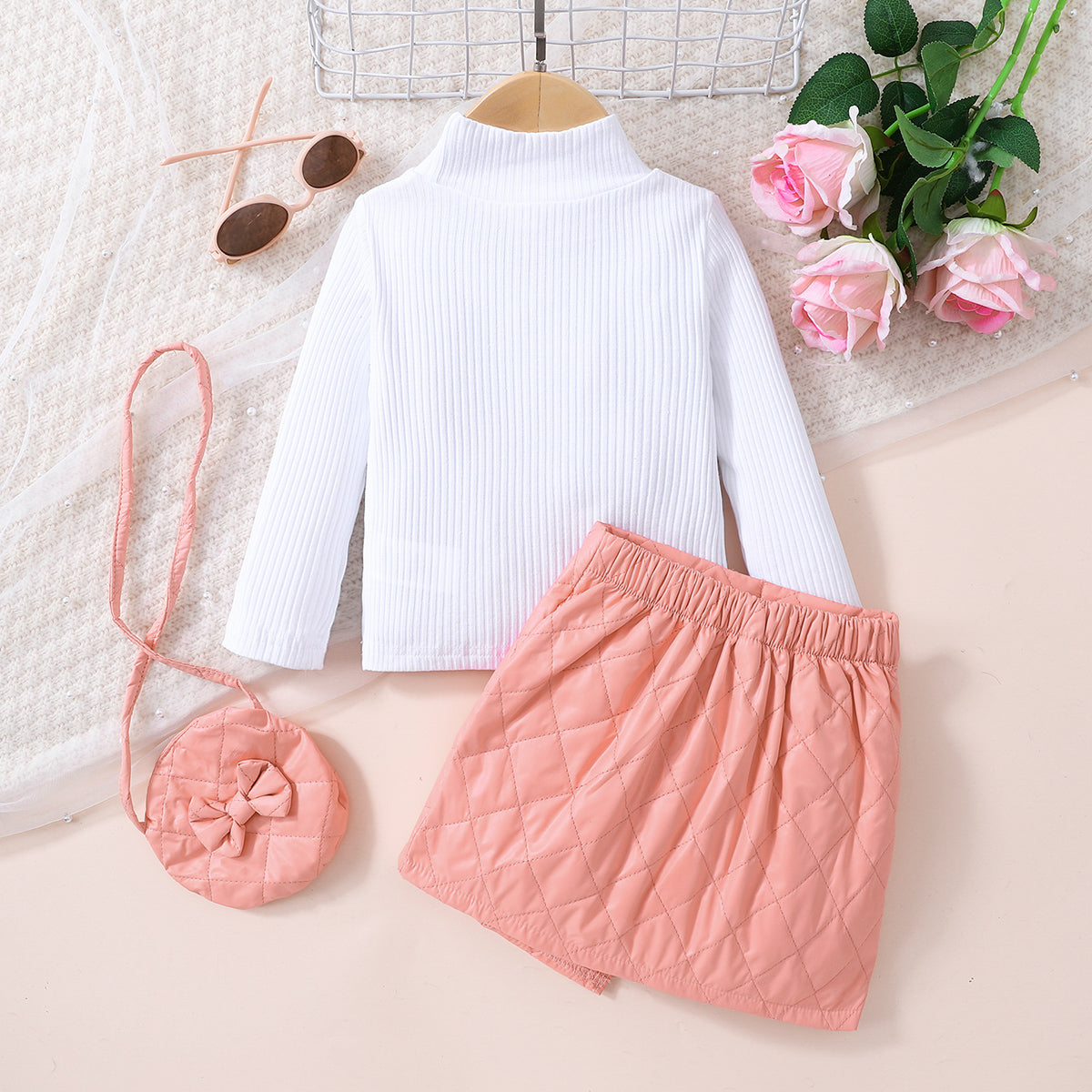 Girls Knit Top and Decorative Button Skirt Set with matching bag, featuring a mock neck and decorative buttons.