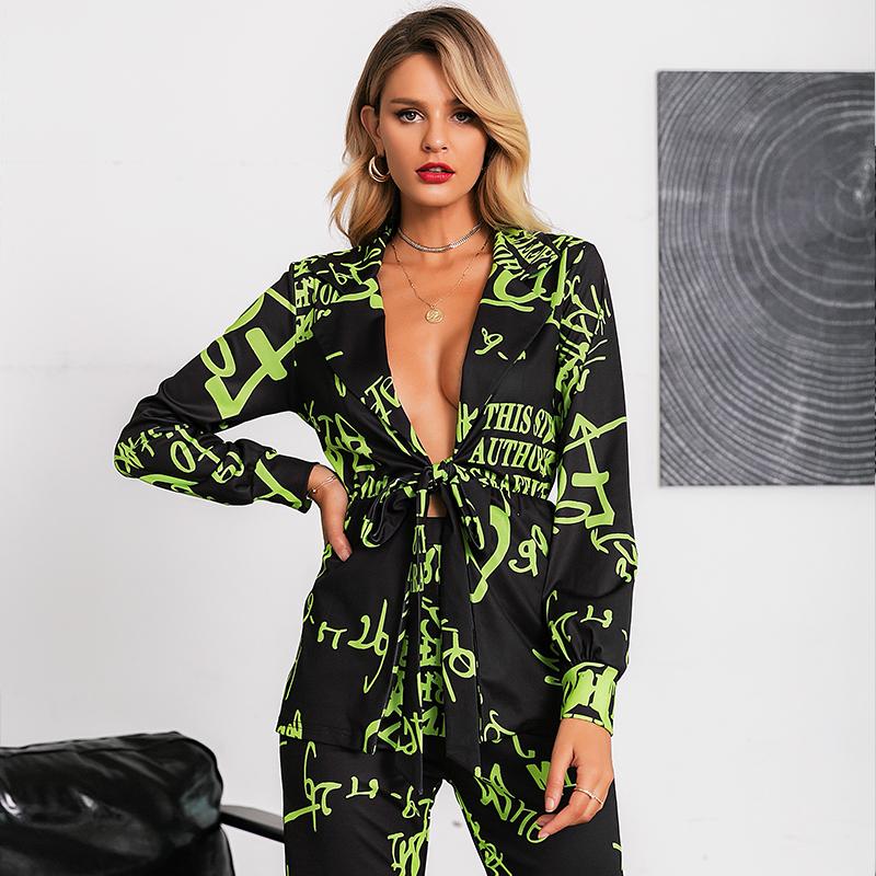 Glamaker Deep V Neck Short Jumpsuit Romper in vibrant neon print, featuring a lace-up design, perfect for clubbing and summer outings.