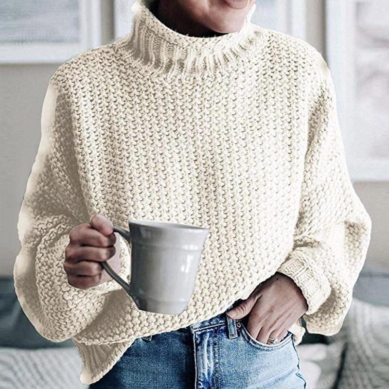 Glamaker Knitted Turtleneck Sweater featuring long lantern sleeves in a solid color, showcasing a stylish high street design.