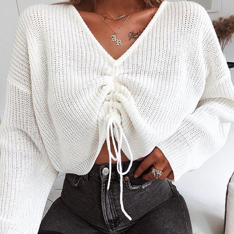 Glamaker sexy winter knitted white sweater with drawstring and V-neck design, showcasing full sleeves and lace-up decoration.