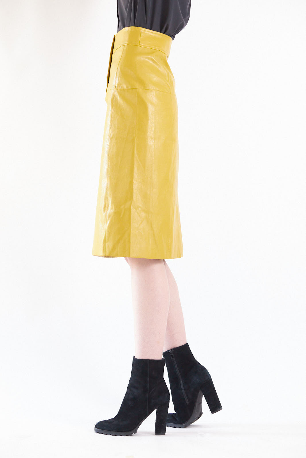 Glossy Vegan Leather Pencil Skirt in mustard color, featuring a stylish front-panel detail and front button fastening.