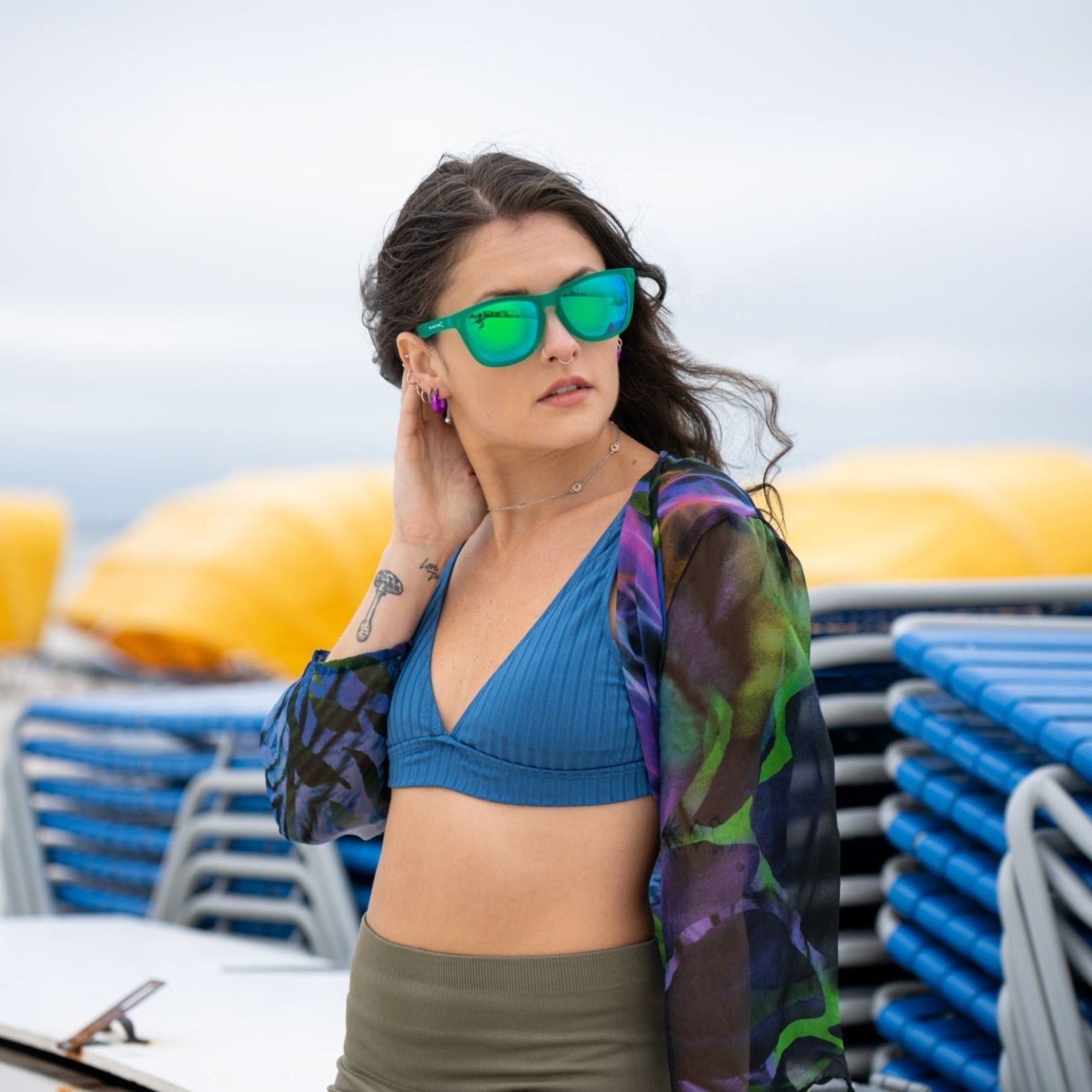 GNTEEZ sunglasses featuring polarized blue revo lenses and a rubber green BPA-free plastic frame, designed for comfort and style.