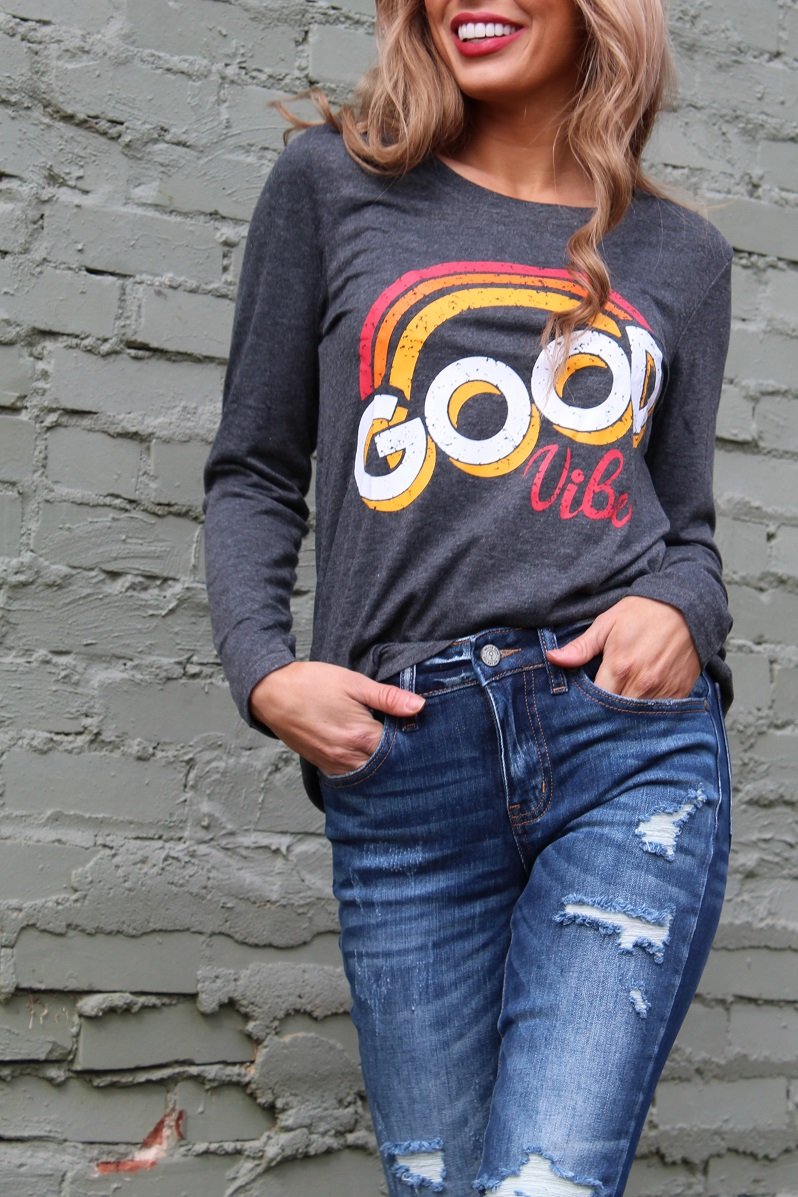 Good Vibes Long Sleeve T-Shirt featuring a vintage-inspired faded graphic design, made from soft cotton and polyester blend.