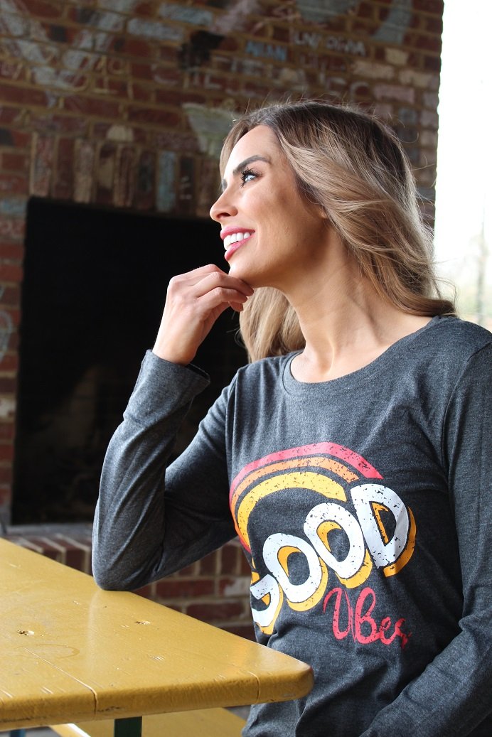 Good Vibes Long Sleeve T-Shirt featuring a vintage-inspired faded graphic design, made from soft cotton and polyester blend.