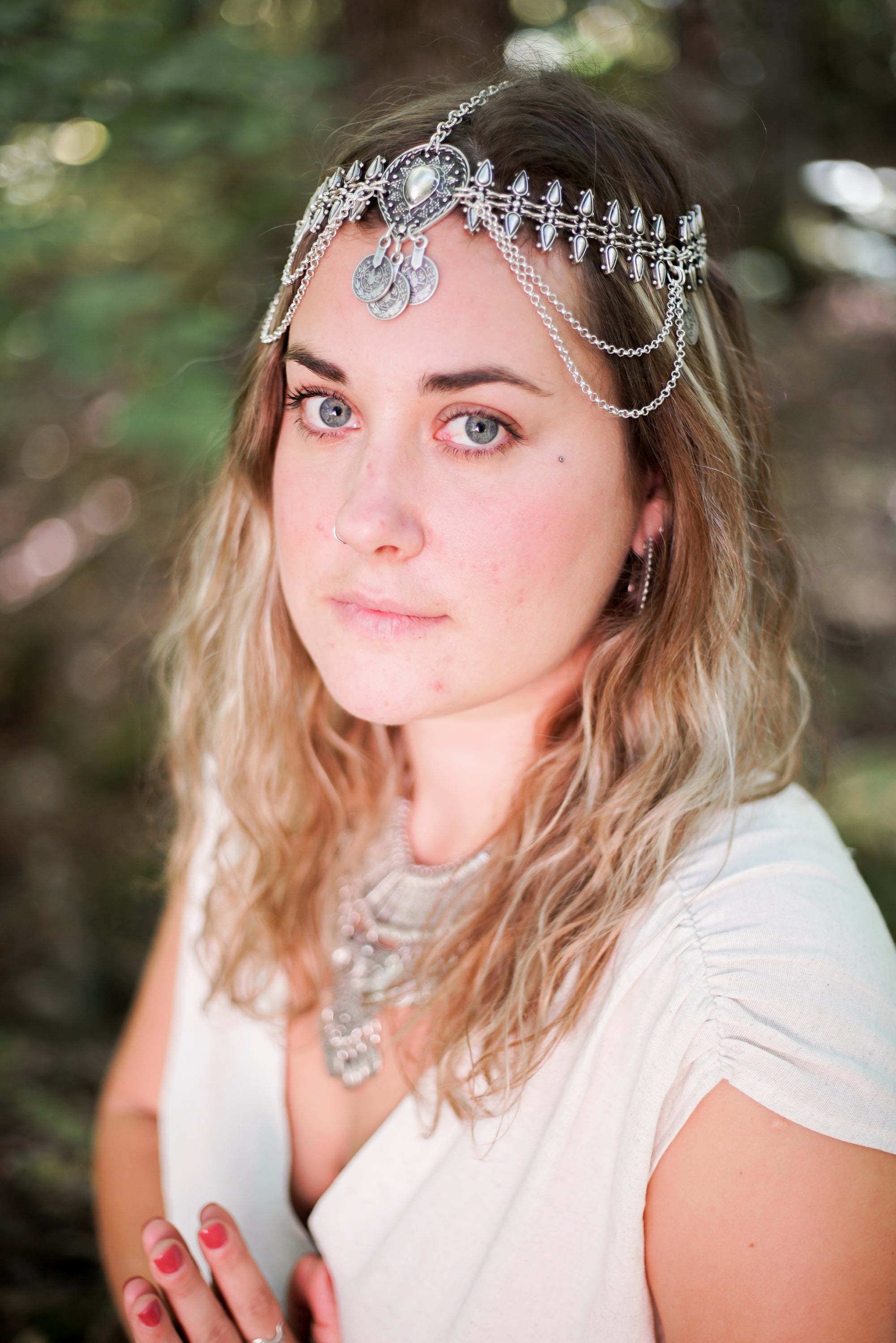 A beautiful silver plated Goddess Hair chain designed for belly dancers, featuring intricate detailing and an adjustable fit.