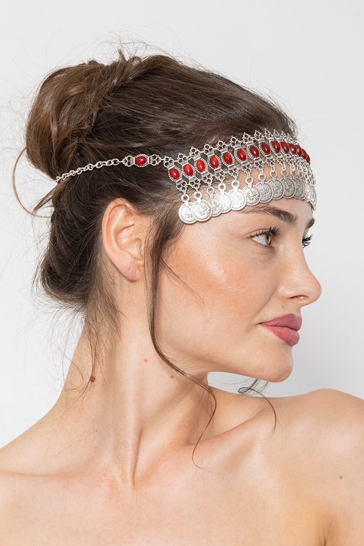 A beautiful silver plated Goddess Head Chain designed for belly dancers, featuring intricate detailing and a shimmering finish.