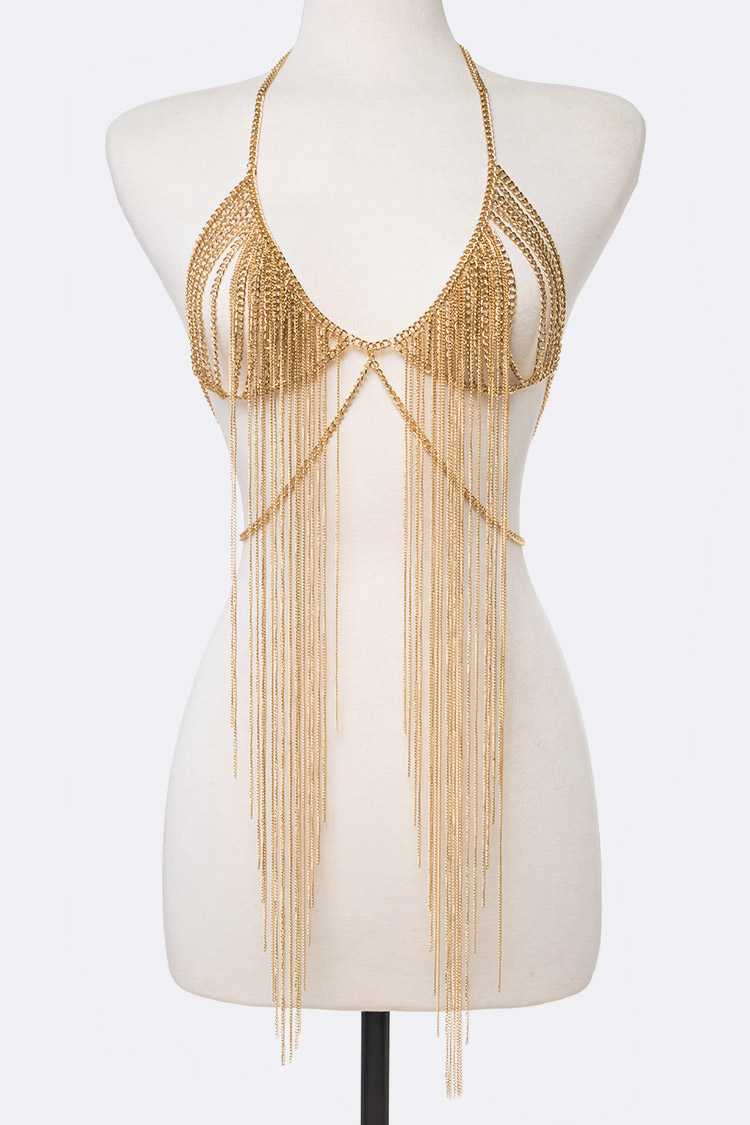 A stunning golden fringe body chain draped elegantly, showcasing its intricate design and luxurious finish.