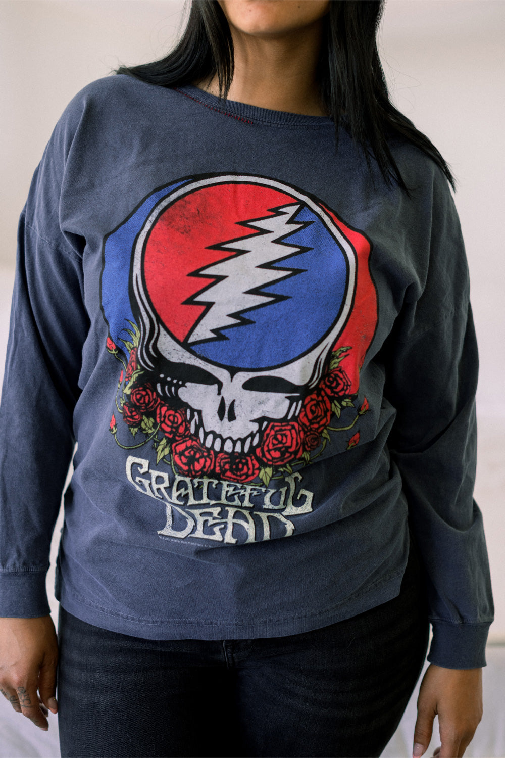 A vibrant Grateful Dead Long Sleeve Tee in various colors, showcasing its stylish design and comfortable fit.