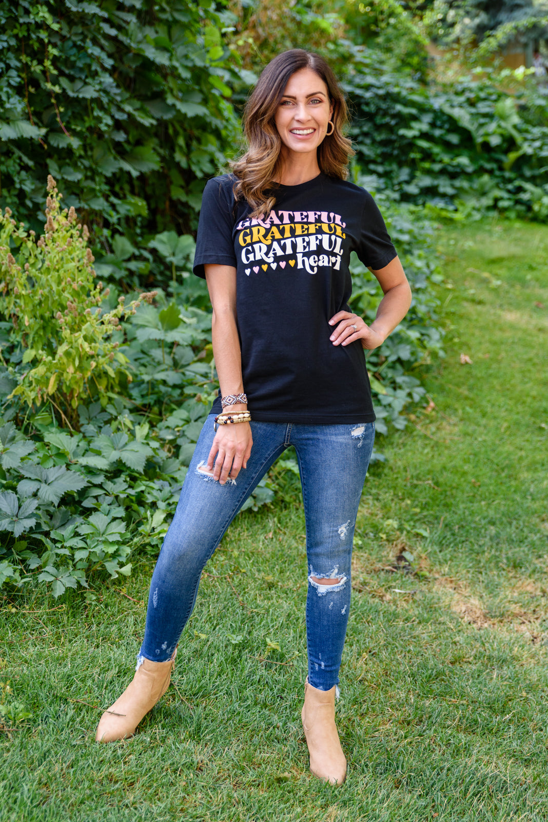 Grateful Heart Graphic T-Shirt in Black featuring a crew neckline and short sleeves, showcasing a cute graphic design.