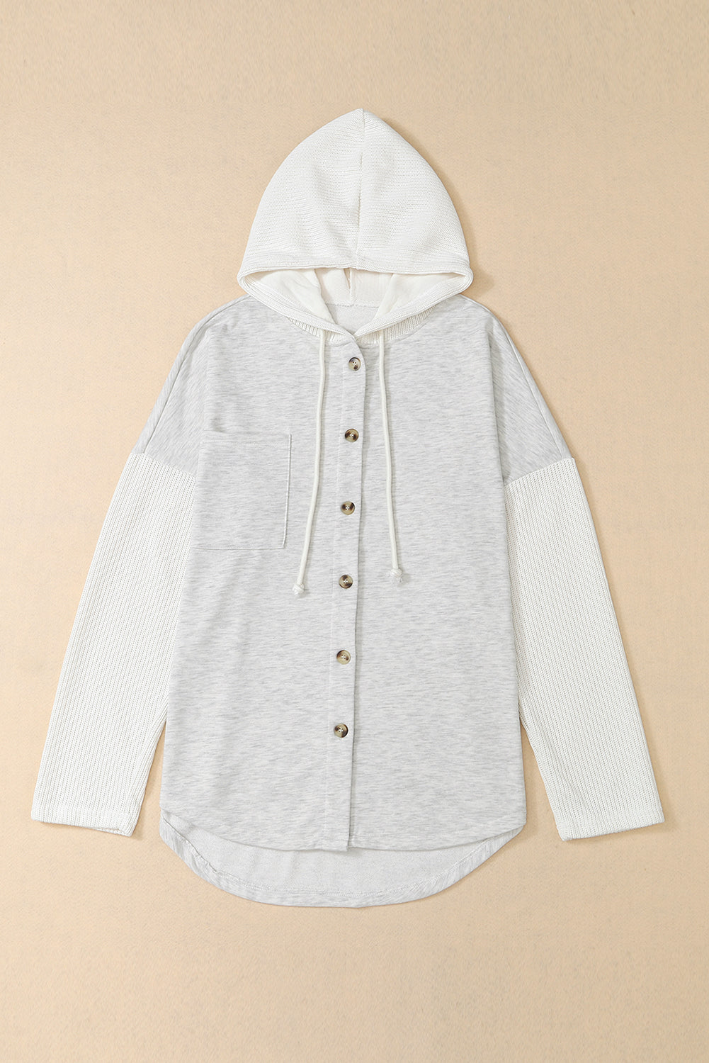 Gray button-up hooded jacket with contrast knitted sleeves, showcasing a stylish and cozy design.