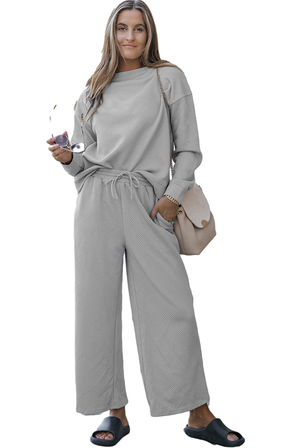 Gray ultra loose textured 2-piece slouchy outfit featuring a long-sleeved top and wide-leg pants with drawstrings, perfect for casual wear.