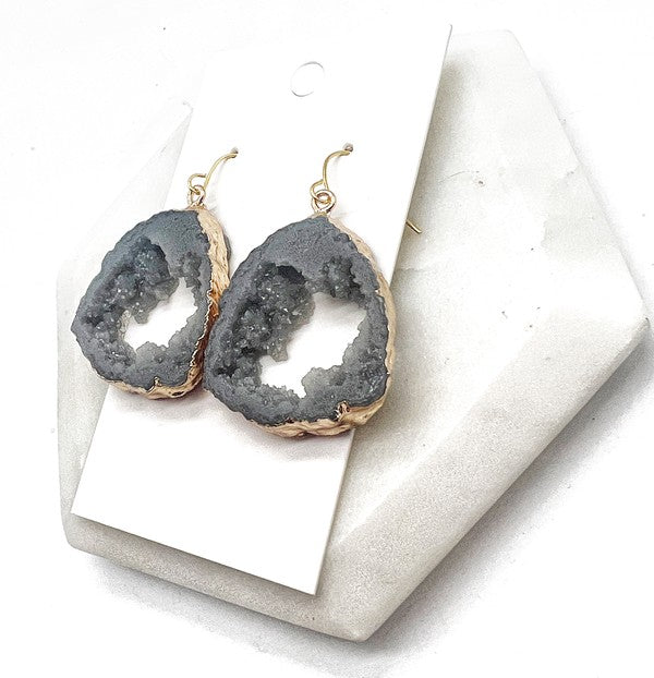 A pair of Grey Gray Agate Slice Resin Statement Earrings with gold sides, showcasing unique patterns and a stylish design.