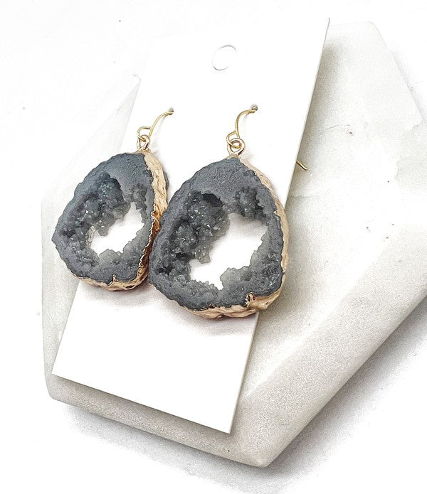 A pair of Grey Gray Agate Slice Resin Statement Earrings with gold sides, showcasing unique patterns and a stylish design.