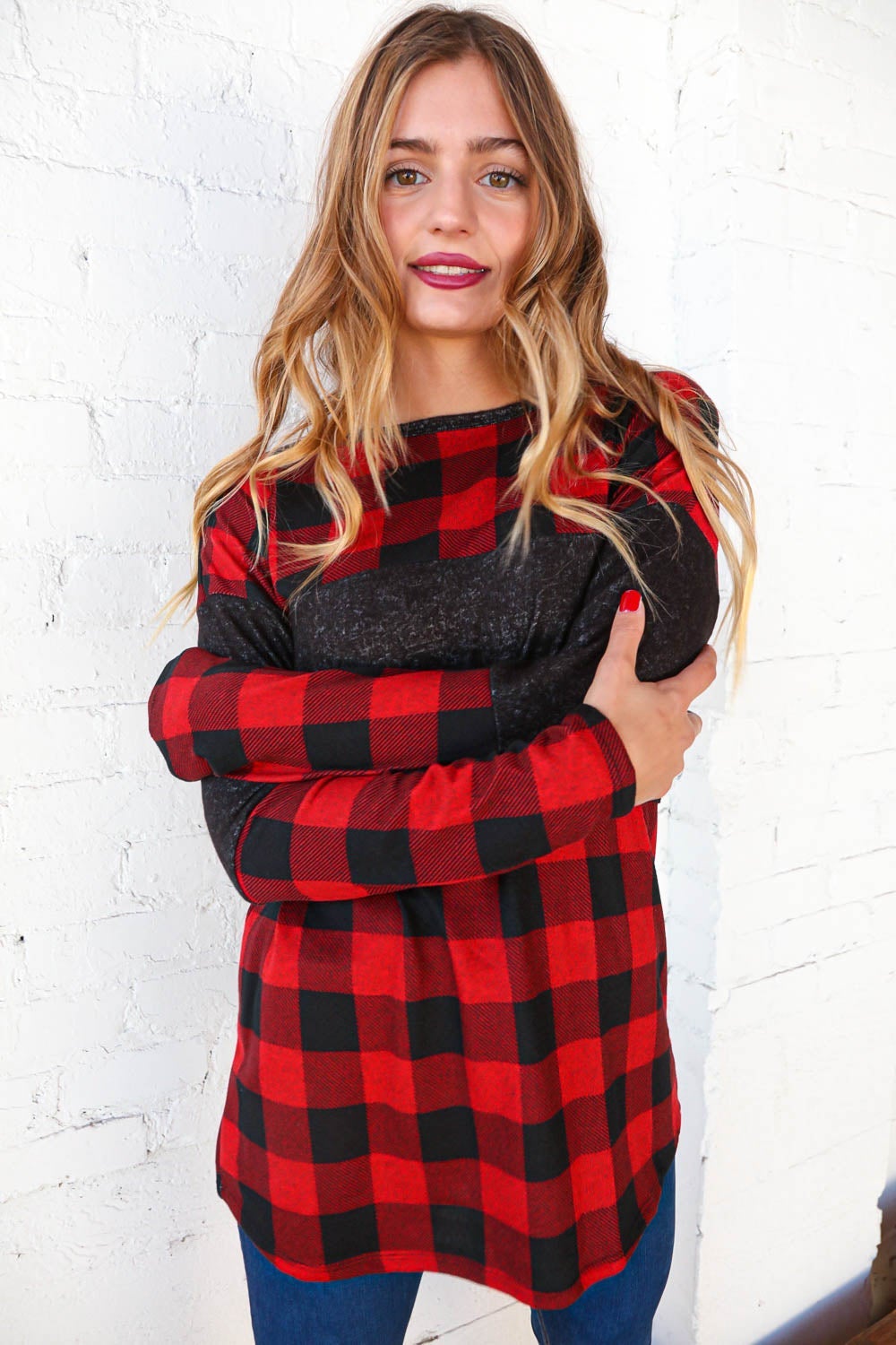 Hacci plaid and black color block pullover showcasing a stylish design with a cozy cashmere-like feel.