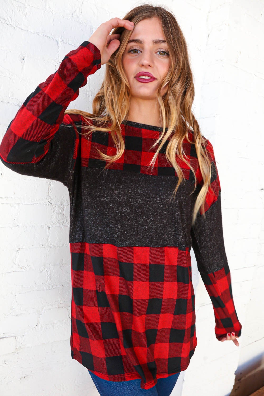 Hacci plaid and black color block pullover showcasing a stylish design with a cozy cashmere-like feel.