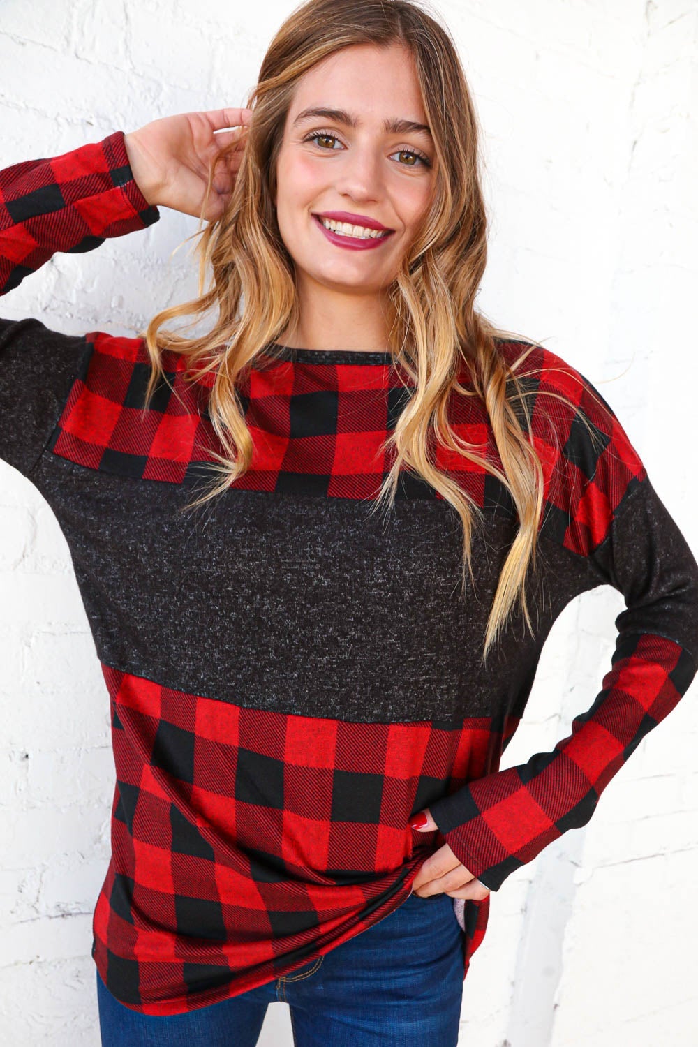 Hacci plaid and black color block pullover showcasing a stylish design with a cozy cashmere-like feel.