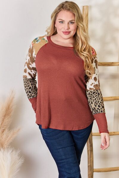 Hailey & Co Full Size Leopard Waffle-Knit Blouse featuring a trendy leopard print and cozy waffle-knit texture, perfect for stylish outfits.