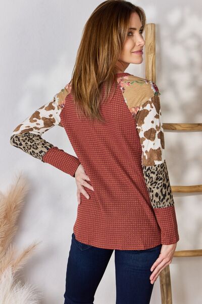 Hailey & Co Full Size Leopard Waffle-Knit Blouse featuring a trendy leopard print and cozy waffle-knit texture, perfect for stylish outfits.