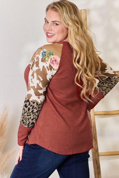 Hailey & Co Full Size Leopard Waffle-Knit Blouse featuring a trendy leopard print and cozy waffle-knit texture, perfect for stylish outfits.