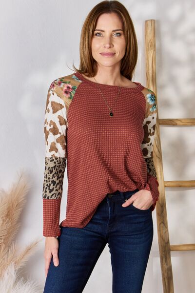 Hailey & Co Full Size Leopard Waffle-Knit Blouse featuring a trendy leopard print and cozy waffle-knit texture, perfect for stylish outfits.