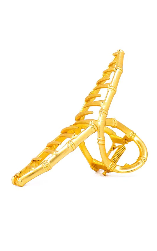 Elegant gold hair clip made from durable metal alloy, perfect for securing hairstyles.