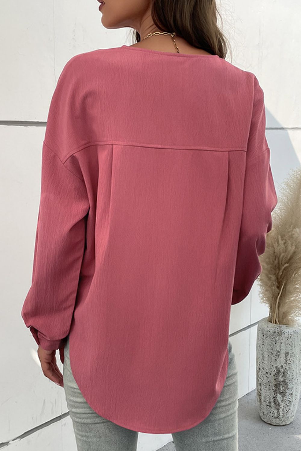 Half Button Pleated Detail Side Slit Blouse in solid color with pockets and long sleeves, showcasing a stylish and casual design.