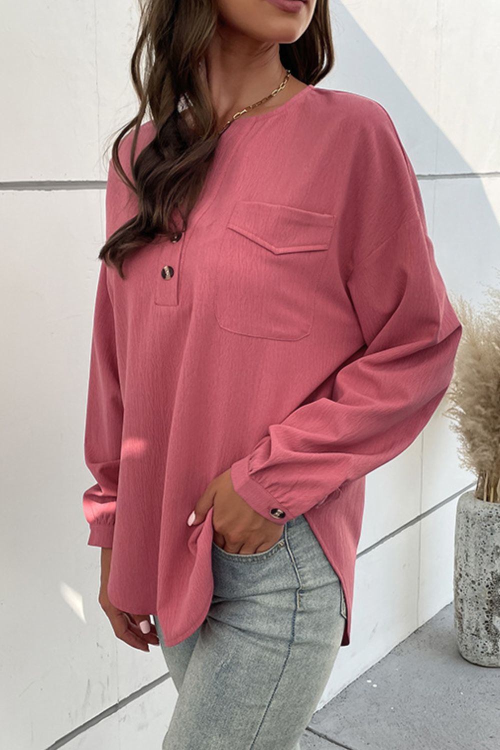 Half Button Pleated Detail Side Slit Blouse in solid color with pockets and long sleeves, showcasing a stylish and casual design.