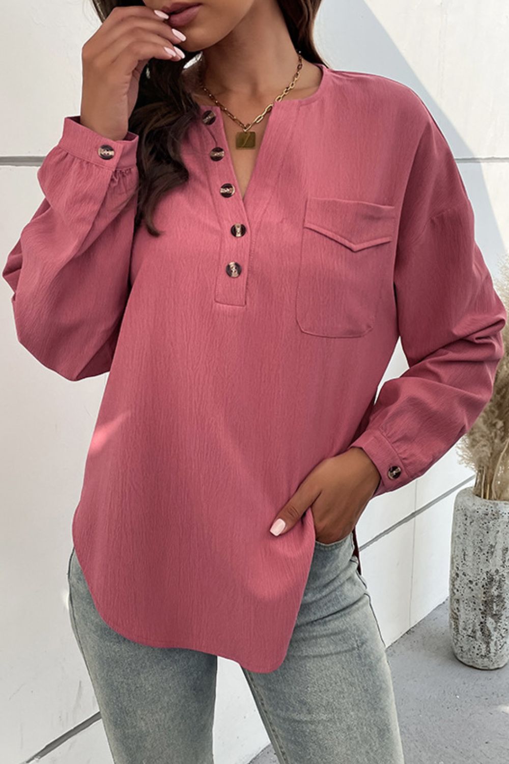 Half Button Pleated Detail Side Slit Blouse in solid color with pockets and long sleeves, showcasing a stylish and casual design.