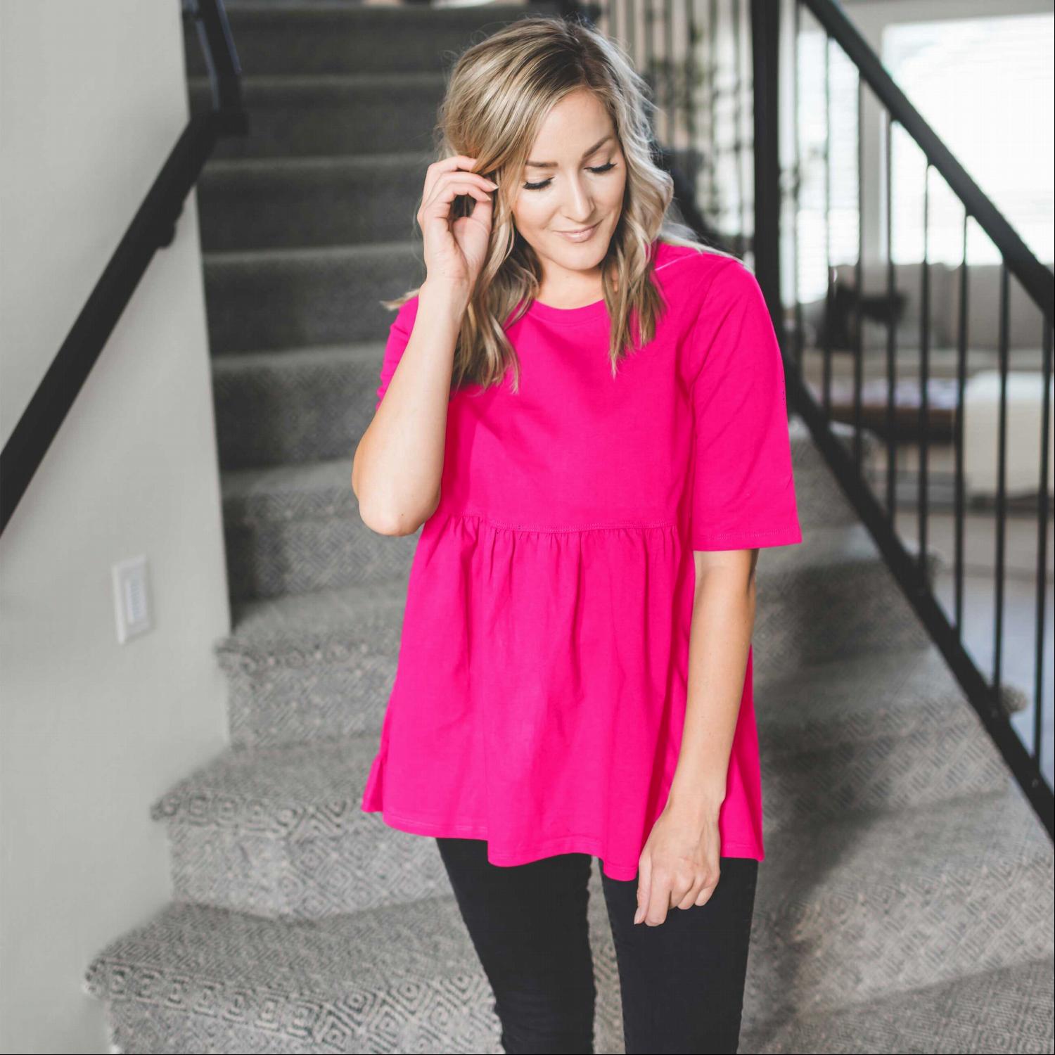 Half Sleeve Empire Waist Shirring Top in dusty teal with elegant ruffles and peplum design, showcasing its flattering silhouette.