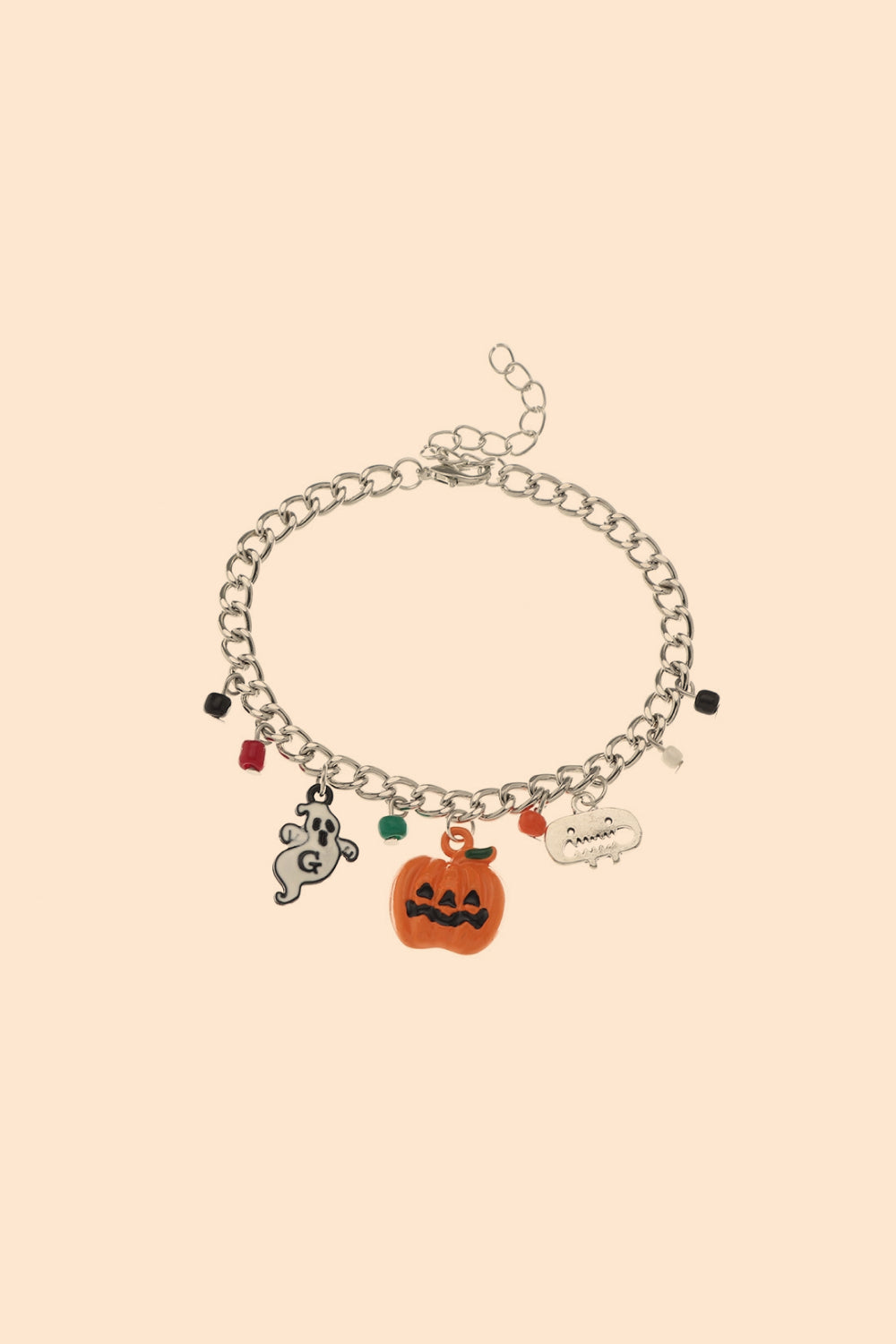 A Halloween charm bracelet and necklace set featuring pumpkin and ghost charms, made from alloy and resin, displayed on a festive background.